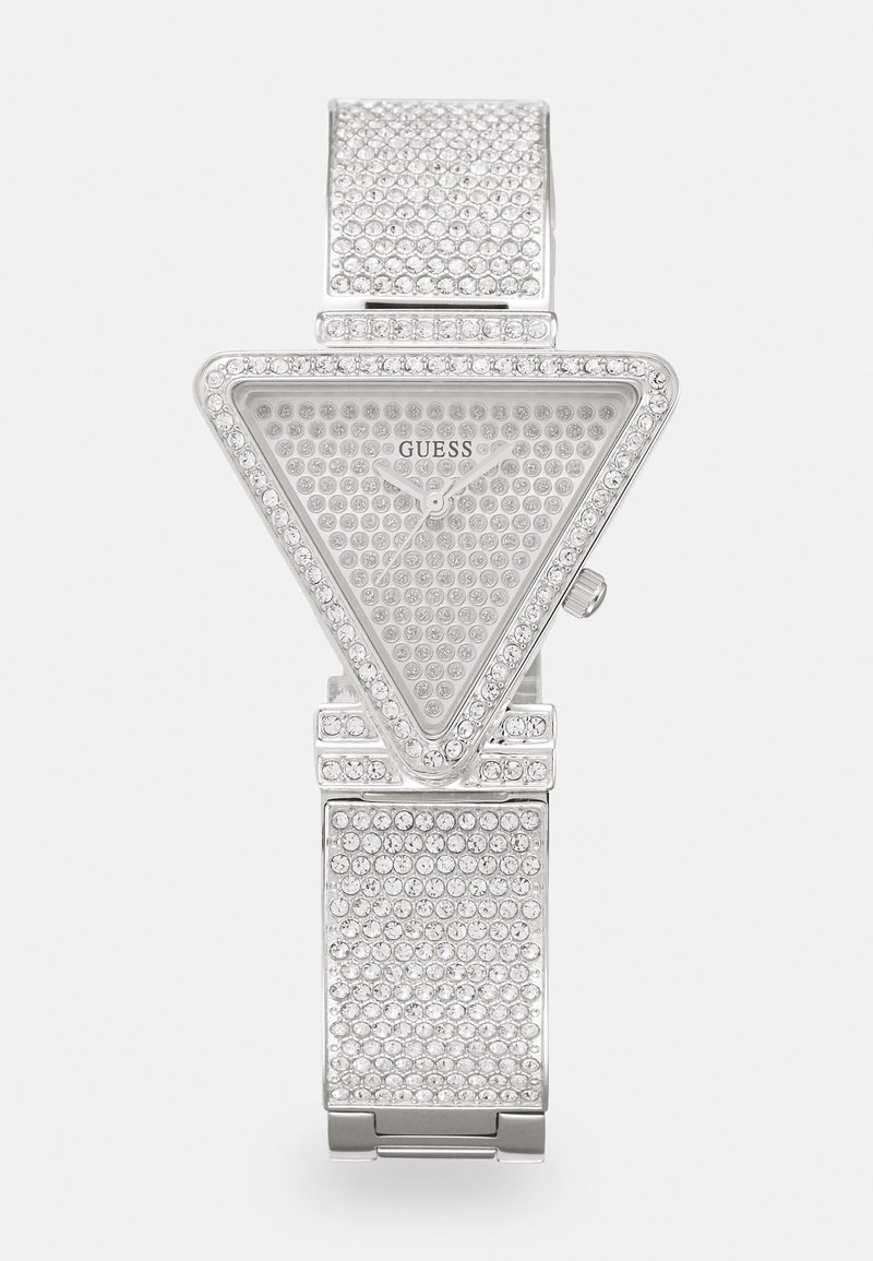 Zilveren driehoekige horloge met een met kristallen versierd ontwerp. Beschikt over een patroon wijzerplaat en een sprankelende armband, die de geometrische vorm benadrukt.