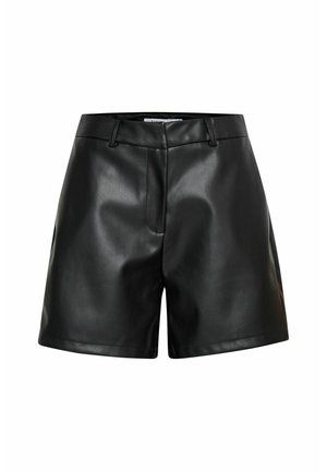 Juodi odiniai šortai su lygiu paviršiumi, pritaikyta forma ir vidutinio aukščio juosmuo. Turintys priekinės kišenes ir tvarkingai siūtas siūles.