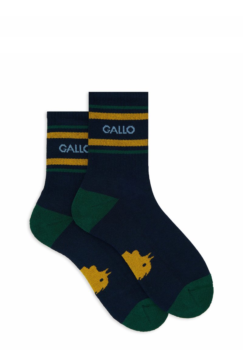 Calze navy con strisce gialle e verdi, con il testo "GALLO". Accenti verdi nel tallone e nella punta, decorati con una grafica gialla.