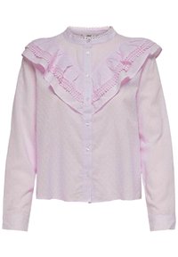 Blusa rosa chiaro con pois, colletto con frange e chiusura a bottoni. Le maniche lunghe e il tessuto testurizzato amplificano i dettagli del design.