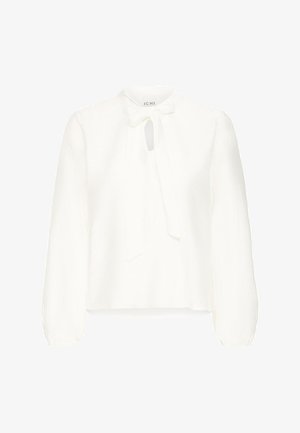 Valkoinen paita, jossa on pitkät hihat, nauhakiinnityksellä varustettu kaulus ja avaus kaulassa. Valmistettu kevyestä, teksturoidusta kankaasta.