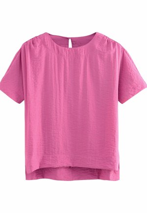 Kurzärmliges, lässiges Oberteil aus weichem, zerknittertem Stoff. Heller Pink-Ton mit einem Schlüsselloch-Rücken-Detail und leicht abgerundetem Saum.