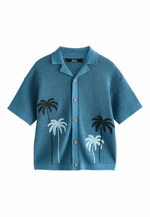 Blue short-sleeve knit shirt with collar and buttons, featuring black and white palm tree designs on front sides.