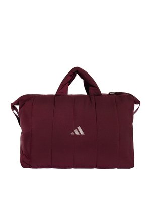 Maronfarvet polstret rektangulær taske med korte håndtag og Adidas-logo foran i midten mod hvid baggrund.