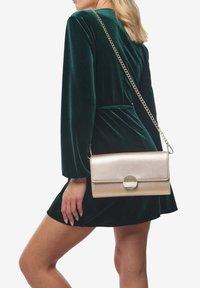 Miriade RADIOSA - Pochette - oro