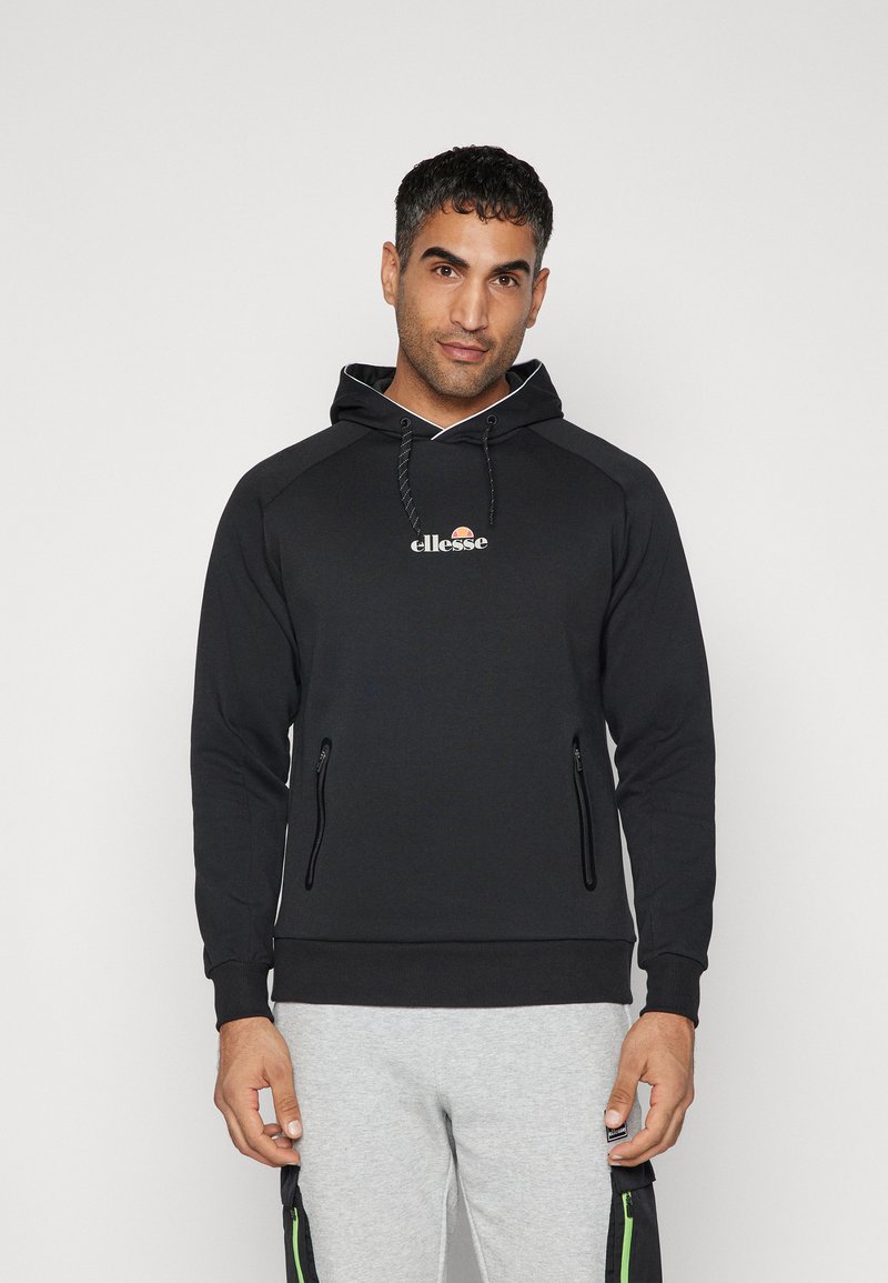 Black hoodie with a kangaroo pocket, zipper details, adjustable drawstring hood, and logo in the center. Smooth fabric with ribbed cuffs.