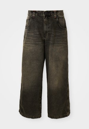 Wide-leg jeans in dark gray denim, featuring a high waist, front pockets, and subtle fading. Metal button and contrasting stitching details.