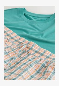 No seleccionado, teal blue