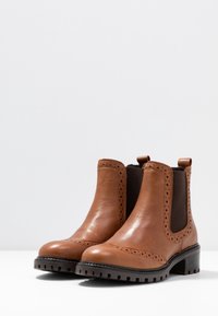 KIOMI Snowboots  - cognac
