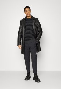 Selected Homme SLHSLIMTAPERED SWICH PANTS  - Calças - black