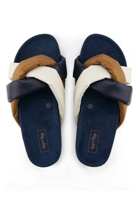 Slide sandals featuring a mix of brown, navy, and white synthetic materials; cross-strap design; plush inner soles; size 37.