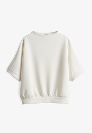 Weißes Kurzarmoberteil mit lockerer Passform, runden Halsausschnitt und elastischem Saum. Hergestellt aus weichem Stoff mit glatter Textur.