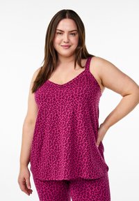 Fuchsia Leoprint-Top mit verstellbaren Trägern und leicht A-Linien-Form. Weicher Stoff; kombiniert mit passender Unterbekleidung.
