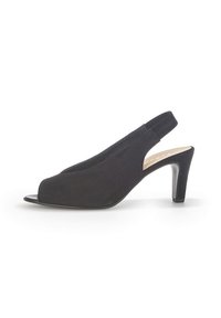 Black suede slingback shoe with open toe, low heel, and smooth texture. Features a strap at the back for secure fitting.