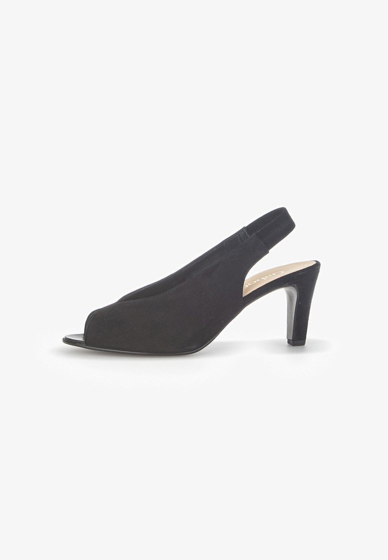 Black suede slingback shoe with open toe, low heel, and smooth texture. Features a strap at the back for secure fitting.