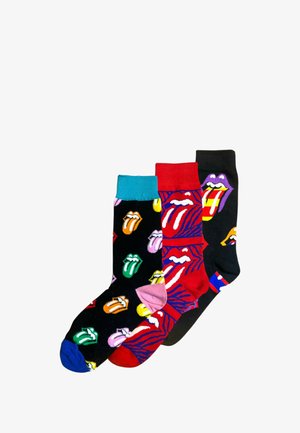 Calze di cotone nere, rosse e turchesi con vari design colorati di labbra e lingue, con risvolti solidi e a fantasia in contrasto.