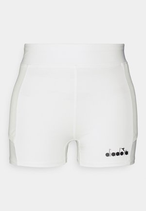 White athletic shorts with a fitted design, made from smooth fabric, featuring black logo detail on the lower left side.