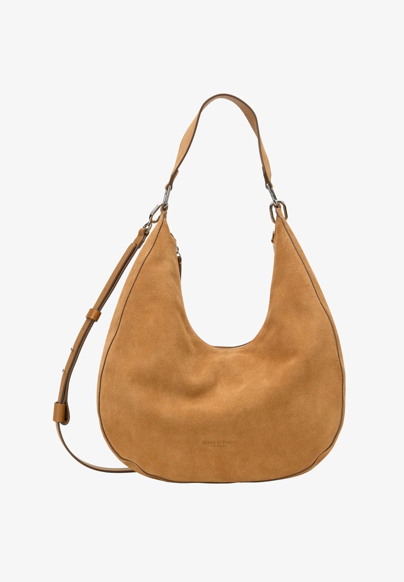 Torba hobo w kawowym zamszu o zaokrąglonym kształcie i regulowanym pasku. Posiada gładkie krawędzie i subtelną markę na dolnym przodzie.
