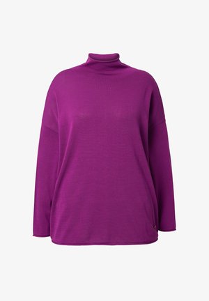Lilla rullekravesweater med lange ærmer, afslappet pasform, ribstrikket tekstur og diskrete sideslidser. Mærke synligt nederst til venstre.