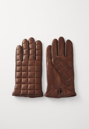 Brown leather gloves with a quilted design, featuring five fingers, and a stitched accent at the wrist. Smooth texture, no visible hardware.