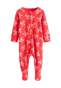 Tutina rossa in cotone con motivo di fiocchi bianchi, maniche lunghe, collo rotondo, chiusura con zip frontale e design con piedi.