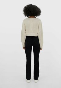 Stradivarius Vaqueros bootcut - black