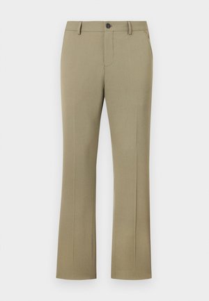 Pantalons évasés marron clair avec une texture tissée lisse. Comprend une fermeture à bouton, un zip, des poches latérales et une coupe ajustée.