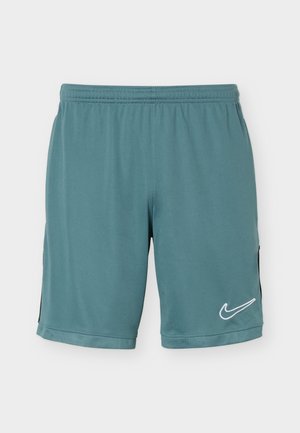 Sportowe krótkie spodenki w kolorze morskim z elastycznym pasem, siateczkowym obszyciem, czarnymi panelami bocznymi i białym logo Nike Swoosh na lewej nodze.