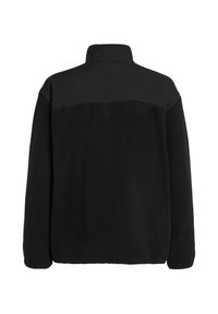 Veste en polaire noire avec une partie supérieure lisse et un bas texturé. Col montant et manches longues sans fermetures visibles.
