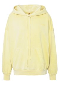 Žlutá bavlněná mikina s kapucí na stahovací šňůrku, přední kapsou a žebrovanými manžetami. Vyšité logo na hrudi. Měkká textura.