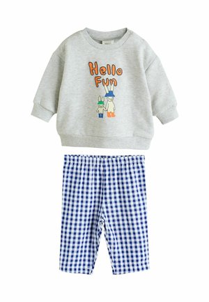 Gray sweatshirt with "Hello Fun" text and bunny graphics, paired with blue and white gingham check pants. Soft, comfortable materials.