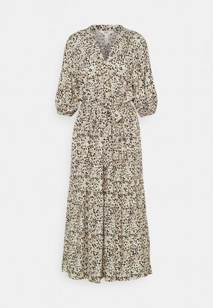 Maxikleid in hellem Beige mit schwarzem Leopardenmuster. V-Ausschnitt, Taillengürtel und dreiviertellange Balloon-Ärmel. Fließende, gestufte Silhouette.