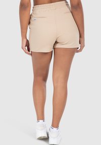 Smilodox FAYNE PRO - Pantaloncini sportivi - creme