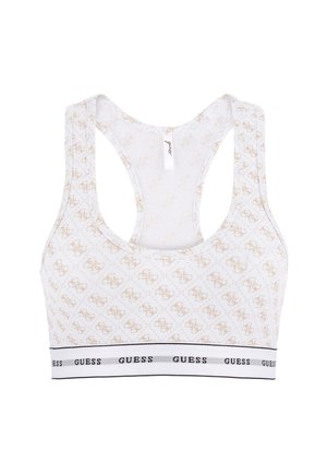 Weiße Bralette mit einem allover Logo-Muster in Gold. Racerback-Design mit einem schwarzen elastischen Band, das mit "GUESS" beschriftet ist. Weicher, dehnbarer Stoff.