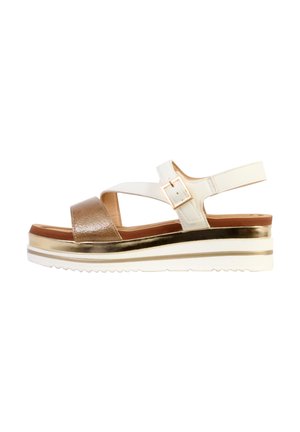 White and bronze open-toe wedge sandal with ankle strap, gold buckle, and white sole featuring a metallic gold stripe.