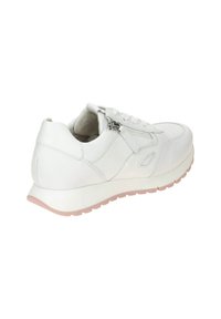 White sneaker with a textured leather upper, lace closure, angled zipper detail, and a pink rubber sole. Rounded toe and padded collar.