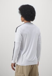 adidas Performance REAL MADRID 24/25 LONG SLEEVE HOME - Klubbkläder - white
