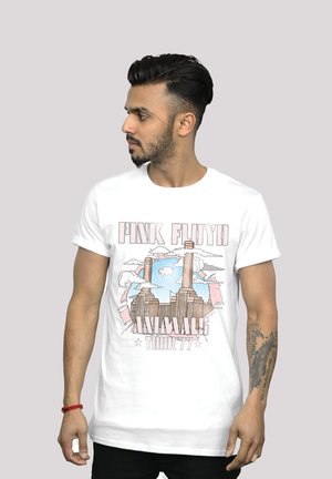 White cotton t-shirt featuring a Pink Floyd graphic with Battersea Power Station, pastel colors, and "ANIMALS TOUR '77" text.