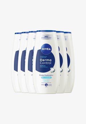 Six white and blue NIVEA Derma Control Defend shower gel bottles with Pure Hyaluron and Pro-Vitamin B5, arranged in a staggered row.
