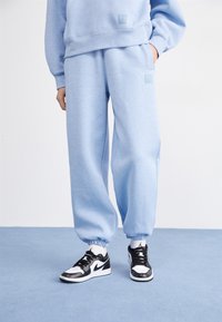 Jordan PANT - Pantalones deportivos - blue