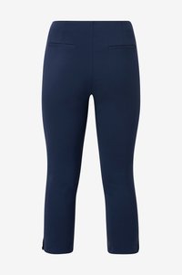 Navy blue capri pants with a smooth texture, featuring two back pockets and side slits at the hem for ease of movement.