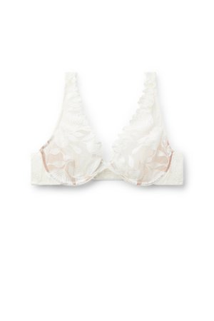 Witte kanten bh met een bloemenpatroon en ruches, met een transparant ontwerp en een gladde onderband in een lichtbeige tint.