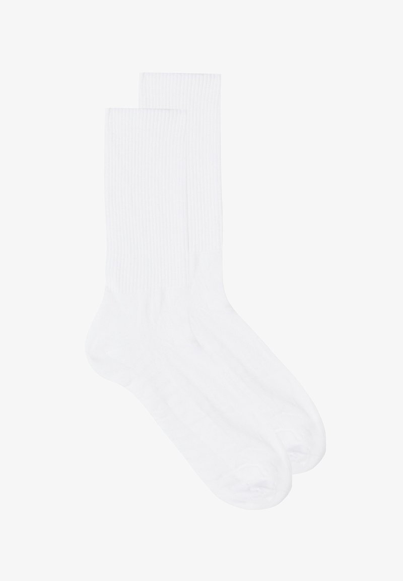 Weißes Baumwollsocken mit Rippstruktur und mittlerer Höhe. Verfügt über eine verstärkte Zehen- und Fersenpartie für Langlebigkeit. Glattes und flexibles Material.