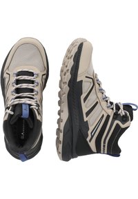 Scarpe da trekking beige e nere con pannelli in rete, suole testurizzate e accenti blu a contrasto. Caratteristiche includono lacci resistenti e lati rinforzati.