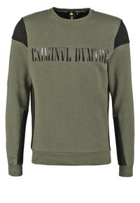 Olijfgroene sweatshirt met zwarte textuur op de schouders, met een glanzende geprinte tekst aan de voorkant. Rond de hals en met geribde manchetten.