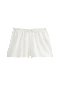 Shorts bianchi in cotone con vita elastica e coulisse. Tessuto leggero con una finitura texturizzata, progettati per comfort e traspirabilità.