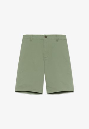 Zöld pamut rövidnadrág lapos elejű, gombos záródással és oldalzsebekkel; egyenes szabású, tiszta befejezéssel az alján.