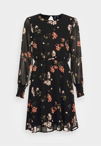 Vestido negro con estampado floral y mangas largas de tul, con puños ajustados y cintura fruncida. Tiene un escote redondo y un detalle de abertura en la espalda.
