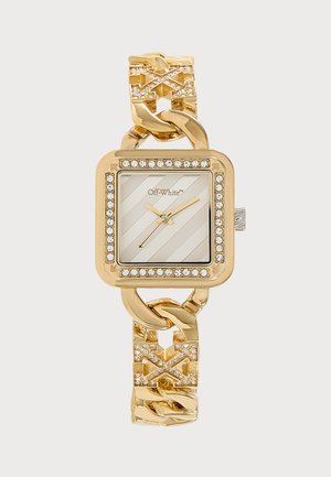 Montre carrée dorée avec lunette ornée de cristaux et bracelet à maillons en chaîne présentant des motifs géométriques incrustés de cristaux et logo Off-White sur le cadran.