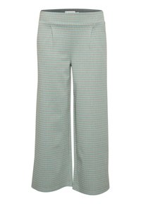 Lichteblauwe wijde broek met een geruit patroon in bruin en turquoise. Beschikt over een soepele textuur en zijzakken.